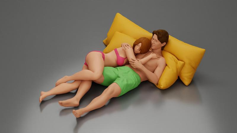Couple cuddling affectionately on pillows wearing underwear