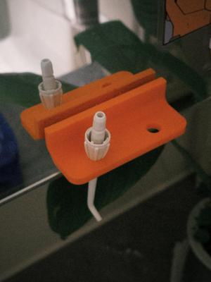 Water flosser nozzle storage