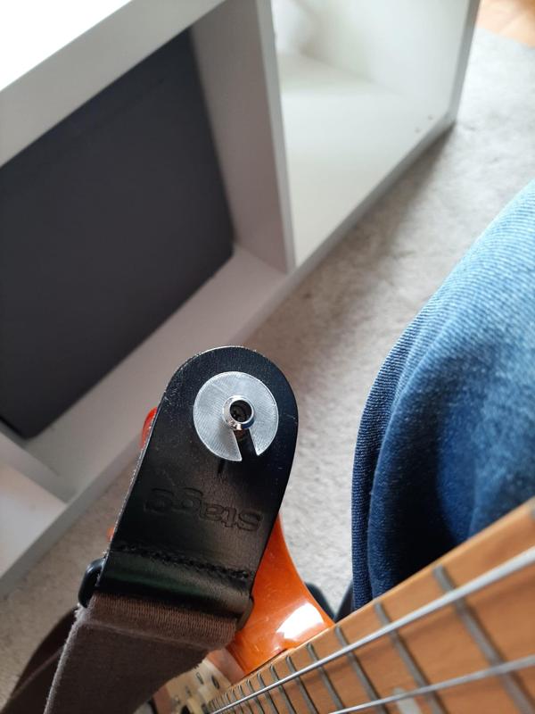 Guitar straplock shim