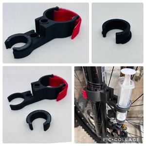 MTB purge syringe clamp