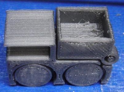 Tiny Toy Dump Truck with Cam Action Bed