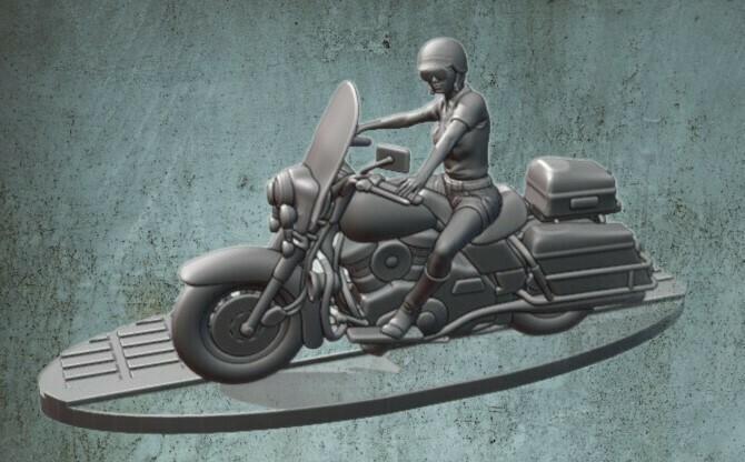 POLICE WOMAN ON MOTORBIKE