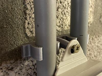 Bracket to attach things to cable