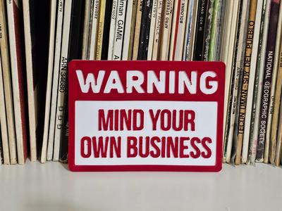 Mind your business warning sign