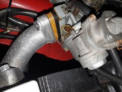 Angled spacer for Honda CT110 with Lifan 125