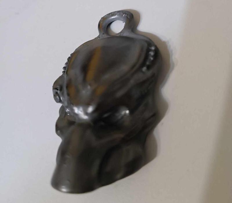 Predator keychain horror