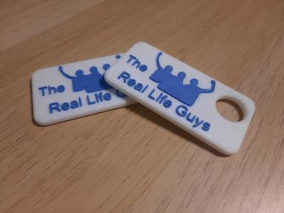 The Real Life Guys Schlüsselanhänger   