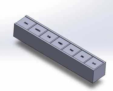 Slide pill box with days of the week   