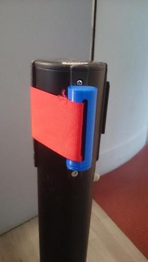 Attache bloc poteau à ruban