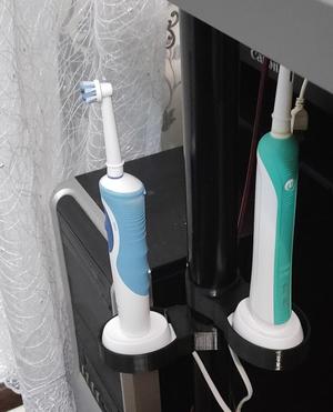 Electric toothbrush holder with ikea table leg attachment.