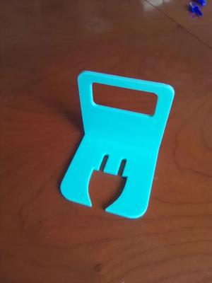 Charging phone holder (no support required)   