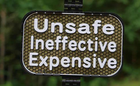 "Unsafe, Ineffective, Expensive" sign   