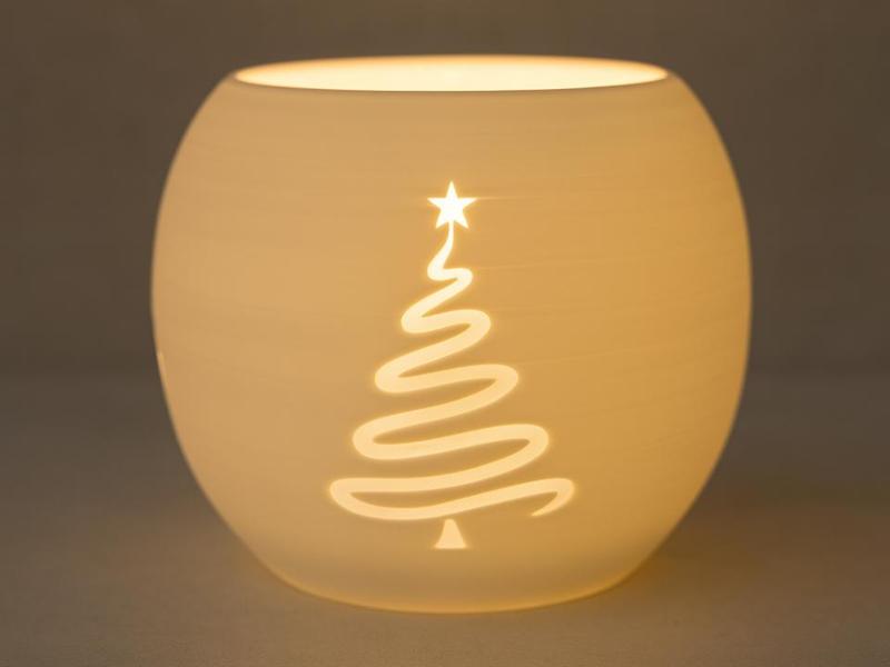Tealight holder with packages and tree