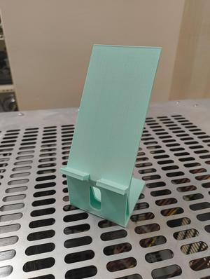 Phone holder with charging socket