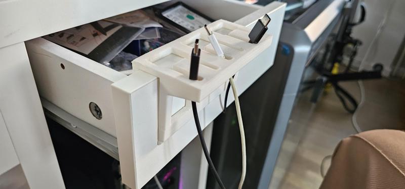 Non-slip cable holder for drawer