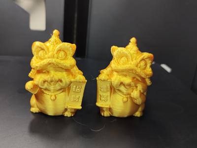 Lucky Cat wearing a Lion Dance Hat