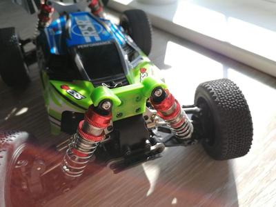 WLToys 144001 enhanced shock tower brace with shock guards