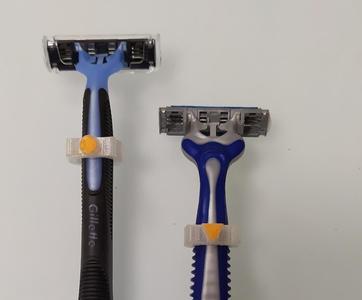 Symbol Mark for shaving razor or toothbrush