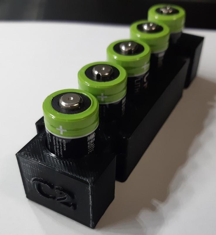 Modular C2 battery holder