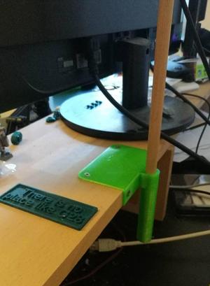 Table mount for holding rod for streaming light