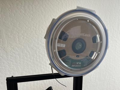 Filament spool holder using a Lock & Lock container (parametric)