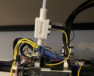 Simple filmanet runout sensor housing using a microswitch