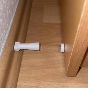 Magnetic door stop with spacing