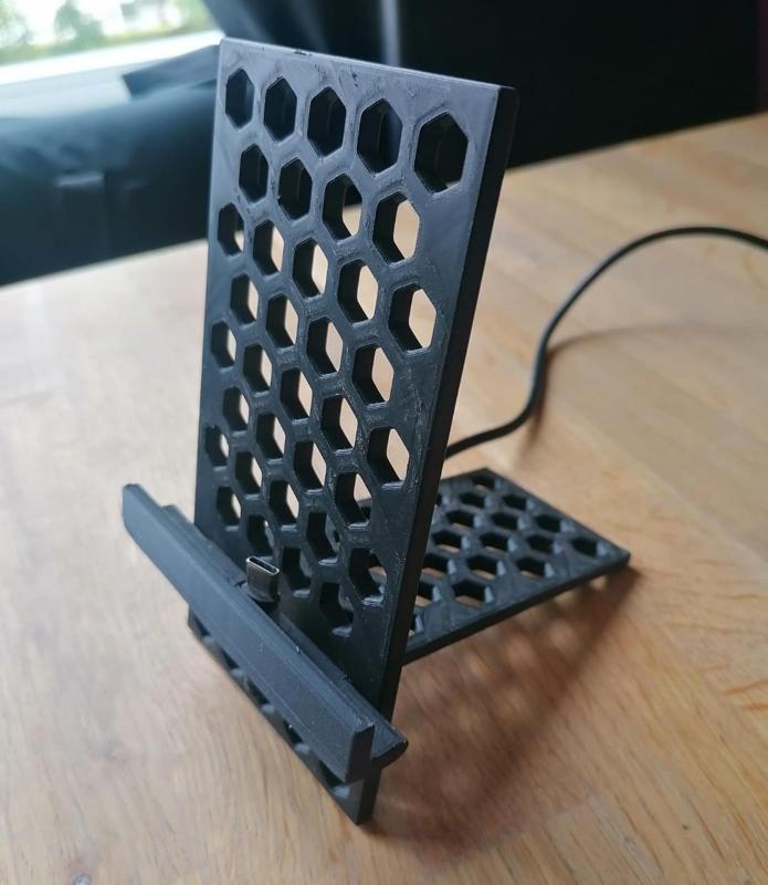 Phone holder with hexagon pattern