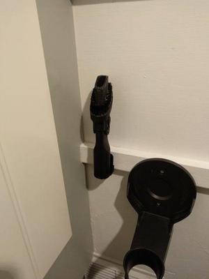 Cordless vacuum accessory holder