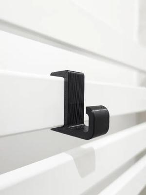 Towel hook for a bathroom radiator   