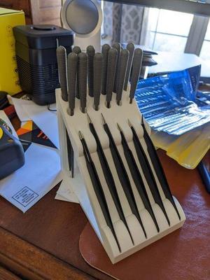 Tweezer and file holder