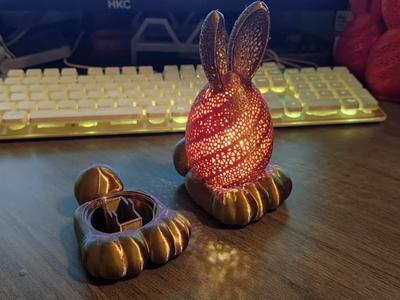 Base for bunny egg lamp wick