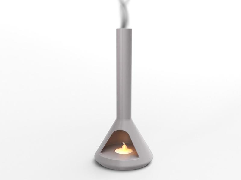 Electric candle holder with an incense compartment in the shape of a fireplace.