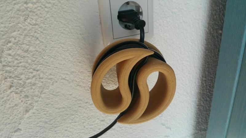 Cable reel wire spool organizer yin yang rope shortener