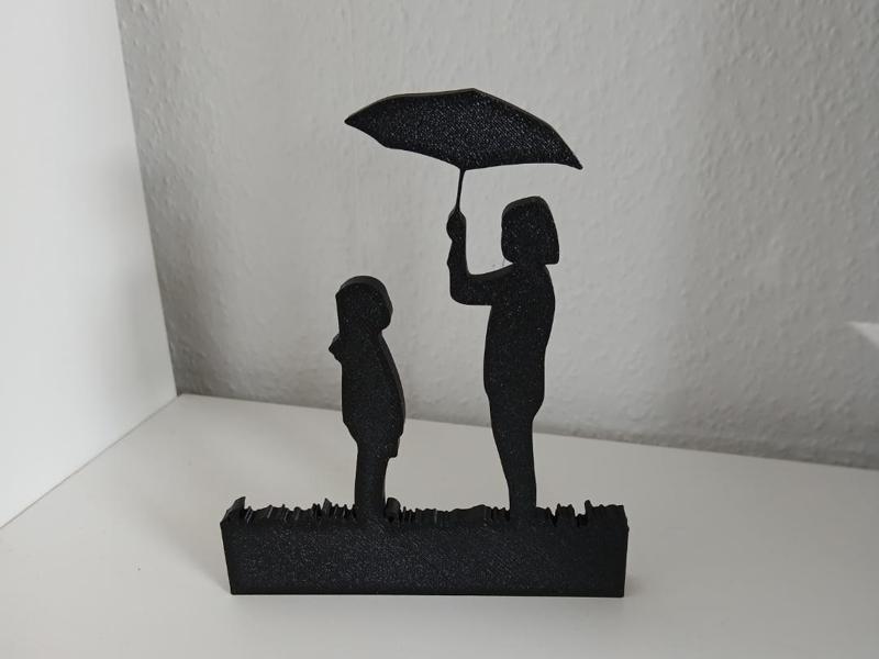 Woman with Child and Umbrella