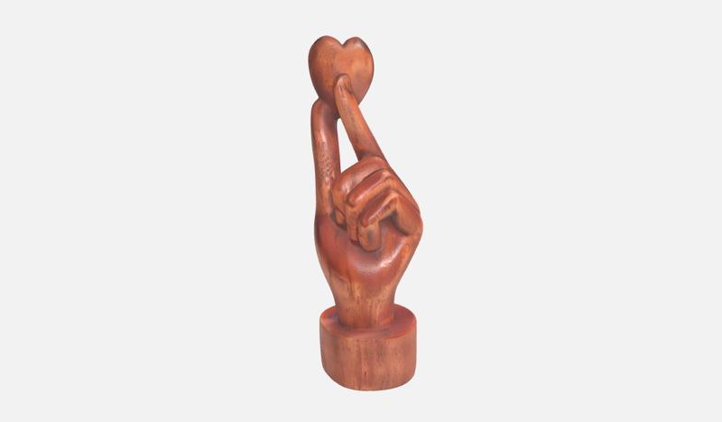 Hand holding heart sculpture, Love gift, engagement gift, marriage, proposal