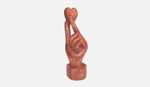 Hand holding heart sculpture, Love gift, engagement gift, marriage, proposal