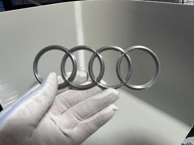 Audi logo, door badge, and tailgate badge