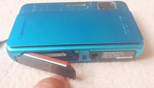 Sony DSC TX10 trappe batterie (battery door)