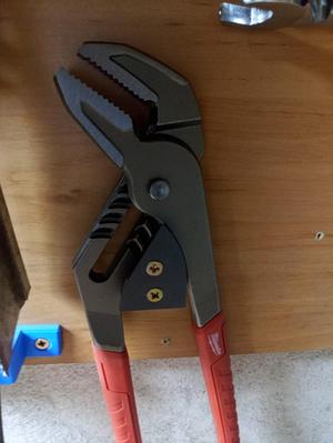 Holder for adjustable plumbing plier