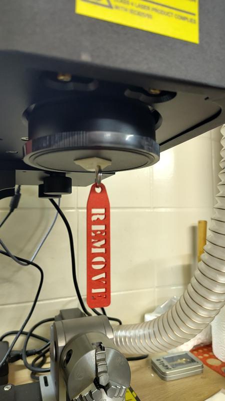 "Remove before Flight" Ribbon for Laser Lens Cover