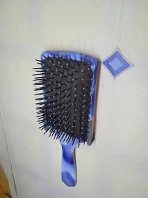 wall-mounted hair brush holder