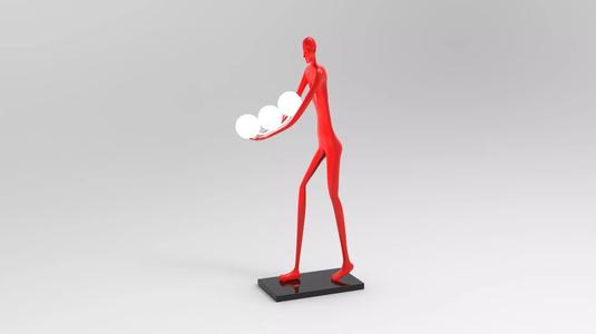 man sculpture lamp