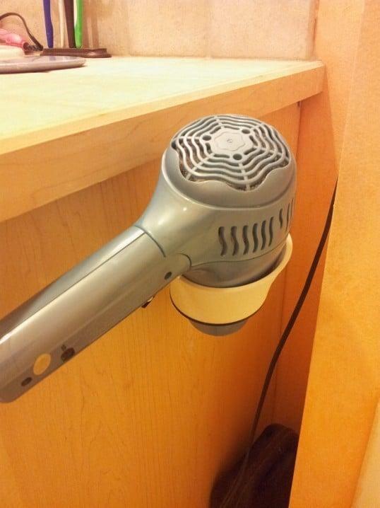 Hair Dryer Wall Holster - for wall or side of a cabinet.