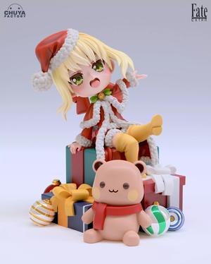 Padoru Padoru doll dressed as santa claus with teddy bear
