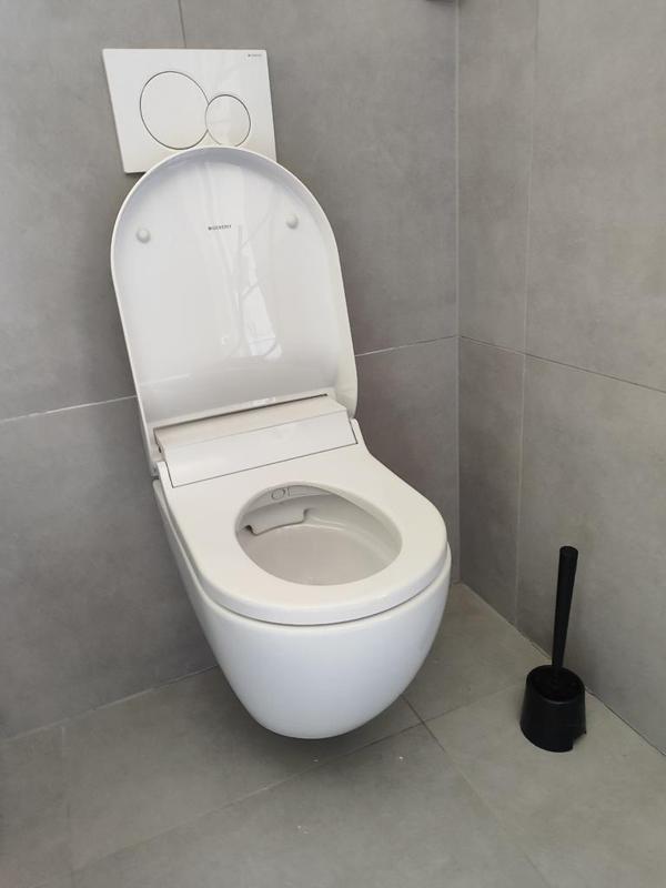geberit electric toilet DuschWC AquaClean Tuma soft-close toilet seat holder
