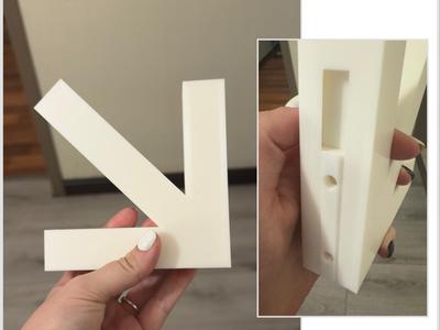 Fun arrow wall hook with slide-in wall mount