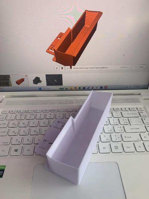 Brother 1034D Thread Catcher   