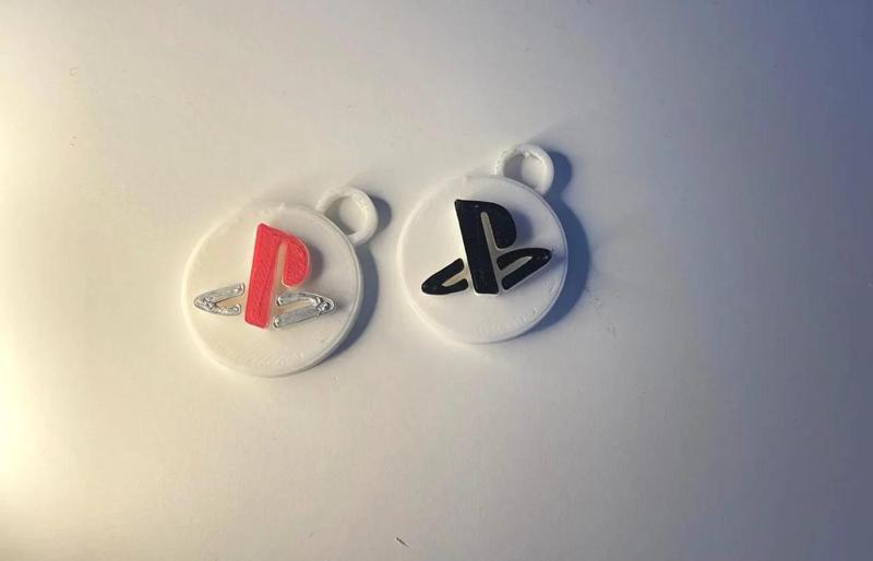 porte clé Play station   
