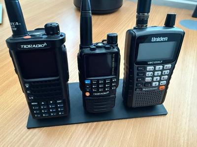 Stand for three handheld scanner or two-way radio devices   
